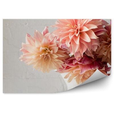 Decor fototapet Flori galben-portocalii așezate într-o vază pe un perete de cărămidă albă