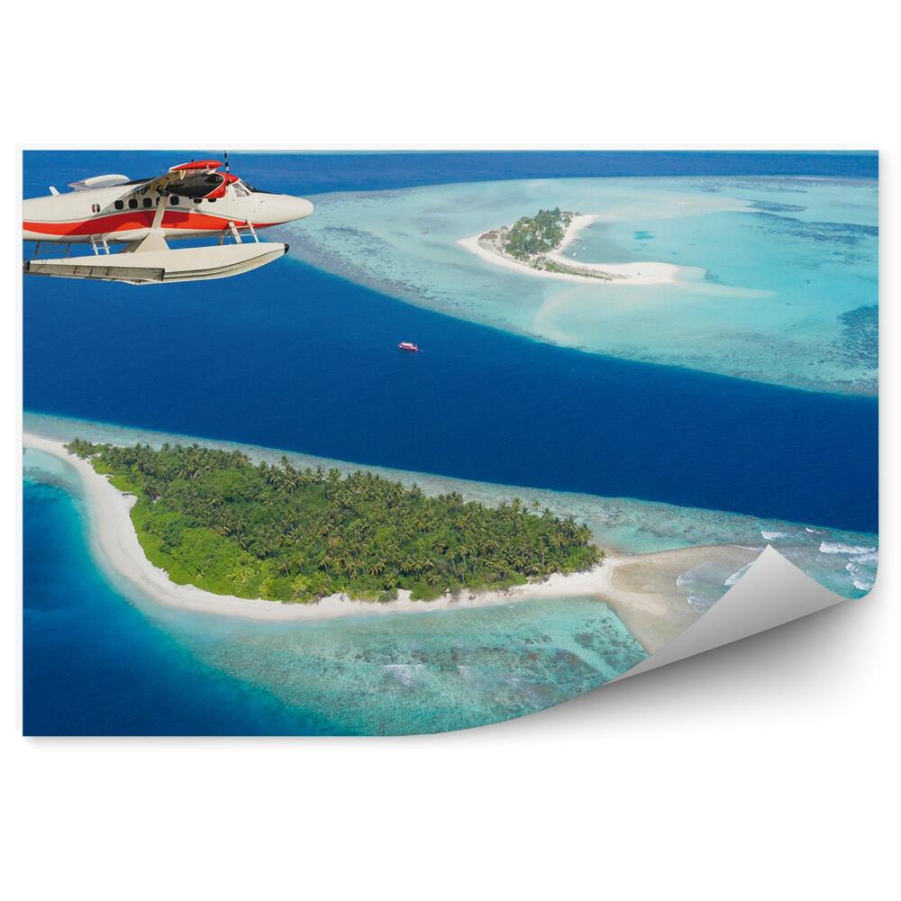 Fototapet vintage Avion care zboară deasupra insulelor Maldive