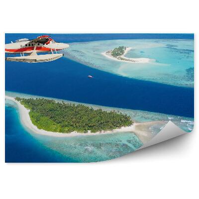 Fototapet vintage Avion care zboară deasupra insulelor Maldive