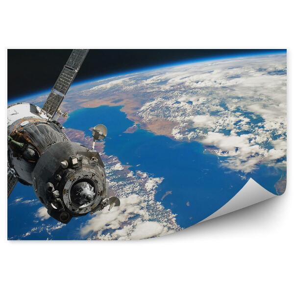Fototapet perete Astronautul Navei Spațiale Orbitează Continentele Oceanice