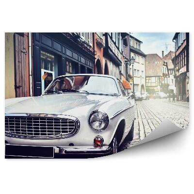 Decor fototapet Clădirile orașului blochează mașina retro strada albă