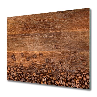 Tocător din sticlă Boabe de cafea pe o placă