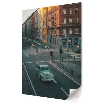 Poster decorativ cu mașină verde pe o stradă din oraș