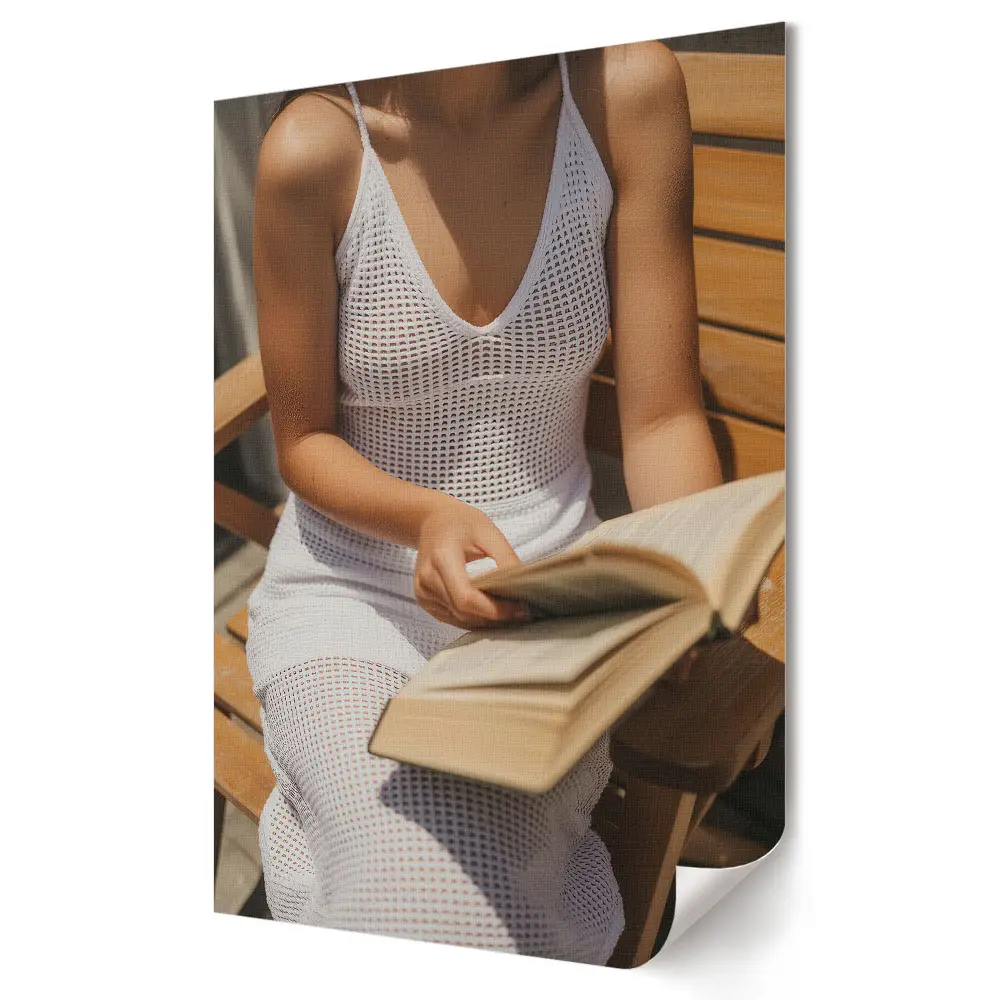 Tablou canvas Relaxare cu o carte la soare