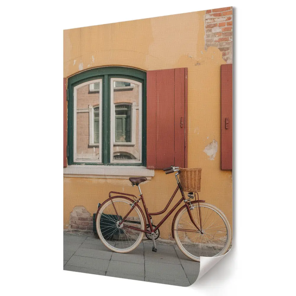 Tablou canvas O bicicletă fermecătoare lângă un perete colorat