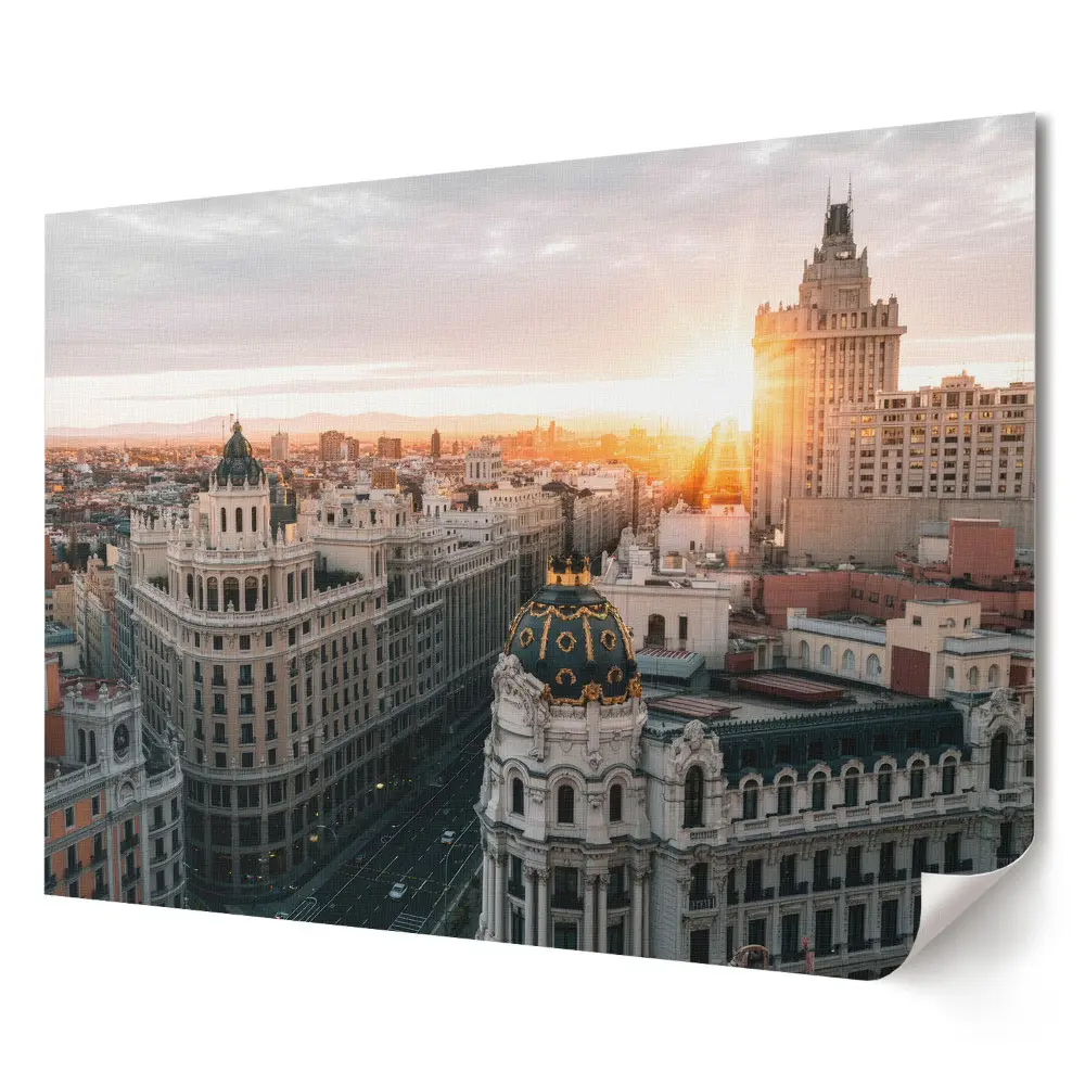 Tablou canvas modern reprezentând un apus de soare deasupra orașului
