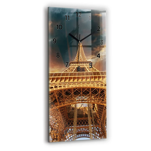 Ceas de sticlă pe perete vertical Turnul Eiffel pe fundalul norilor